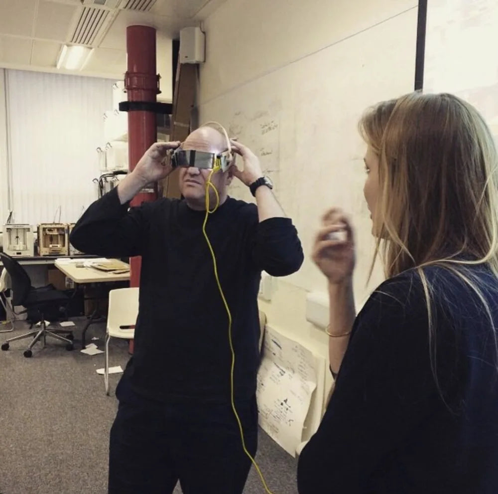 Trying on the first electrochromic glasses prototype in the studio